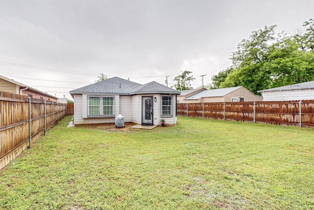 2613 Rochester St, Dallas, TX 75215 - rear view of house featuring a shingled roof