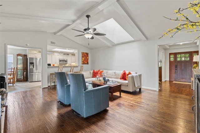 10420 Carry Back Cir, Dallas, TX 75229 - living room featuring a skylight, wood finished floors, and ceiling fan
