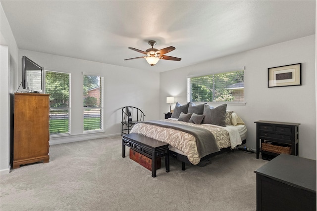 10420 Carry Back Cir, Dallas, TX 75229 - bedroom featuring carpet floors, multiple windows, and ceiling fan