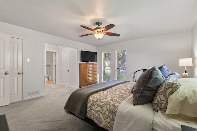 10420 Carry Back Cir, Dallas, TX 75229 - bedroom with light carpet and a ceiling fan