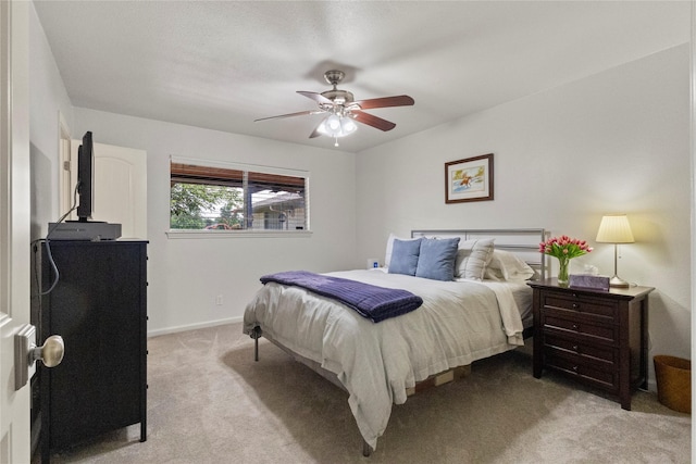 10420 Carry Back Cir, Dallas, TX 75229 - bedroom featuring light colored carpet and a ceiling fan