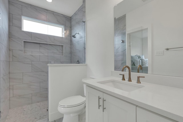 219 Mulkey Rd, Waxahachie, TX 75167 - bathroom with walk in shower, vanity, and toilet