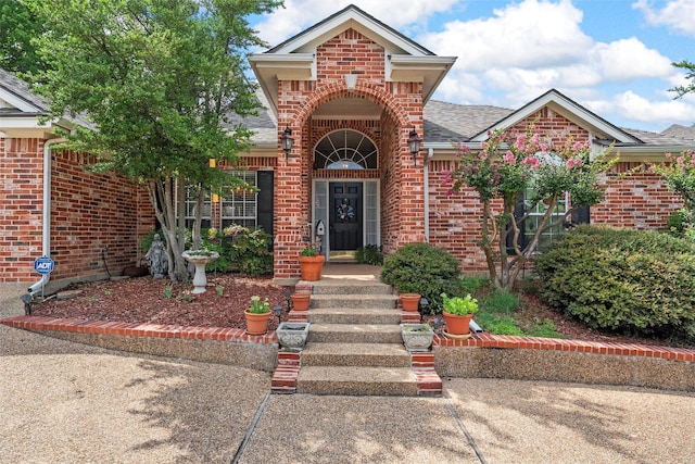 4215 Green Oak Dr, Waco, TX 76710 - view of front of property with brick siding and roof with shingles