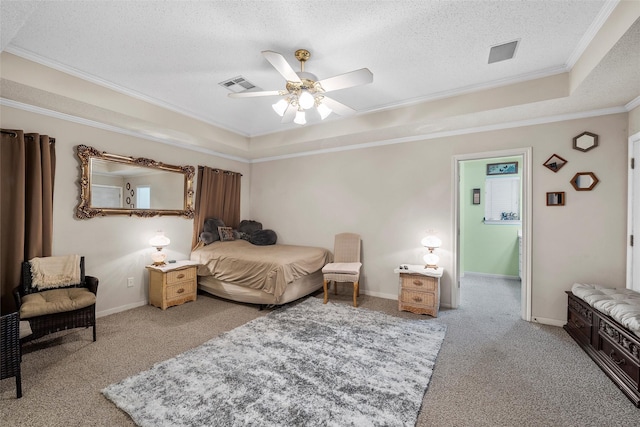 4215 Green Oak Dr, Waco, TX 76710 - carpeted bedroom featuring ornamental molding, a tray ceiling, a textured ceiling, a ceiling fan, and baseboards