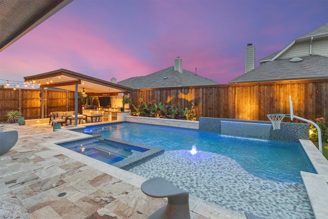 800 Marion Farm Rd E, Little Elm, TX 75068 - pool at dusk featuring a fenced backyard, a patio area, a pool with connected hot tub, an outdoor hangout area, and a ceiling fan