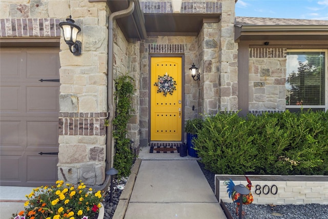 800 Marion Farm Rd E, Little Elm, TX 75068 - entrance to property with stone siding and a garage