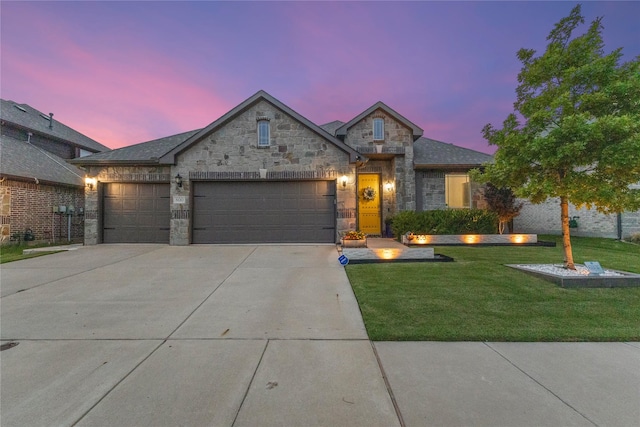 800 Marion Farm Rd E, Little Elm, TX 75068 - french provincial home with stone siding, a garage, concrete driveway, and a front lawn