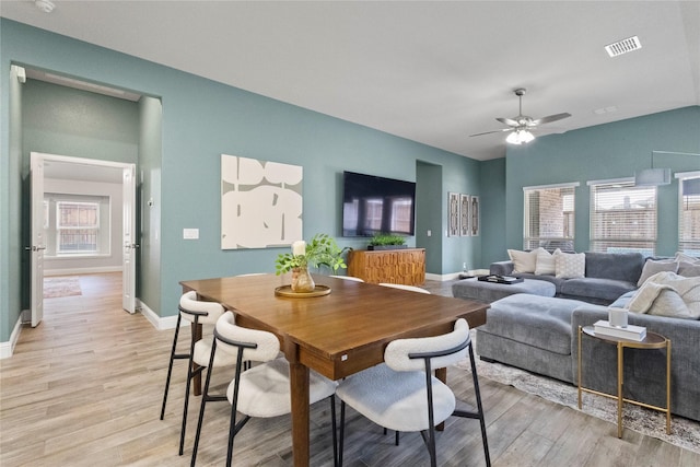 800 Marion Farm Rd E, Little Elm, TX 75068 - dining room featuring light wood-style floors, baseboards, and a ceiling fan