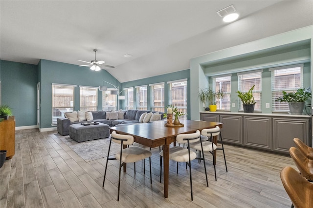 800 Marion Farm Rd E, Little Elm, TX 75068 - dining area with light wood-style floors, lofted ceiling, a ceiling fan, and baseboards