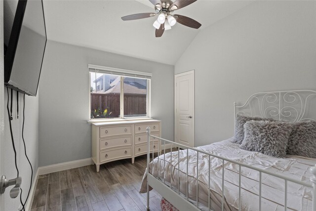 800 Marion Farm Rd E, Little Elm, TX 75068 - bedroom with wood finished floors, baseboards, ceiling fan, and high vaulted ceiling