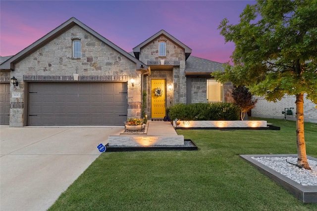 800 Marion Farm Rd E, Little Elm, TX 75068 - french country inspired facade with stone siding, an attached garage, concrete driveway, and a front lawn