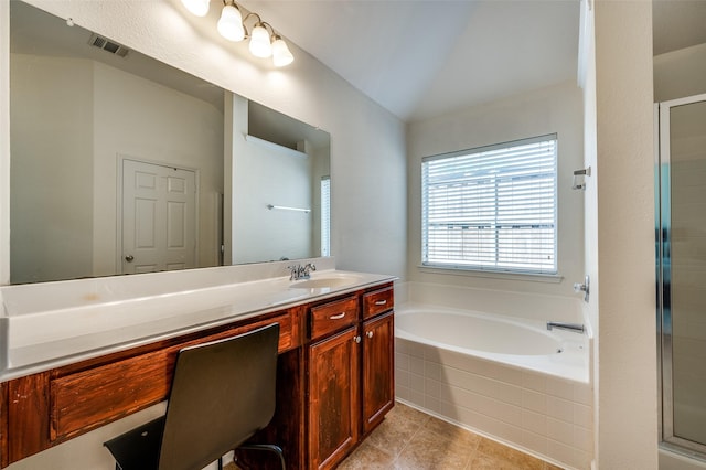 2813 Ashton Way, Mckinney, TX 75071 - full bath with vanity, a garden tub, a stall shower, vaulted ceiling, and tile patterned flooring