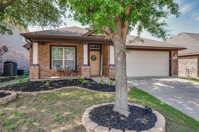 2813 Ashton Way, Mckinney, TX 75071 - view of front facade featuring brick siding, a garage, driveway, and roof with shingles