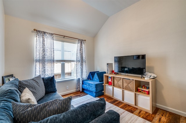 2813 Ashton Way, Mckinney, TX 75071 - living area with wood finished floors, baseboards, and vaulted ceiling