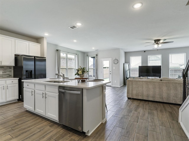 3019 Dakota Trl, Crandall, TX 75114 - kitchen with appliances with stainless steel finishes, a sink, dark wood-type flooring, ceiling fan, and light countertops