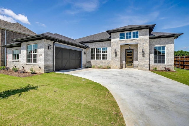 604 Bluff Point Ln, Haslet, TX 76052 - view of front of home featuring driveway, a garage, brick siding, and a shingled roof