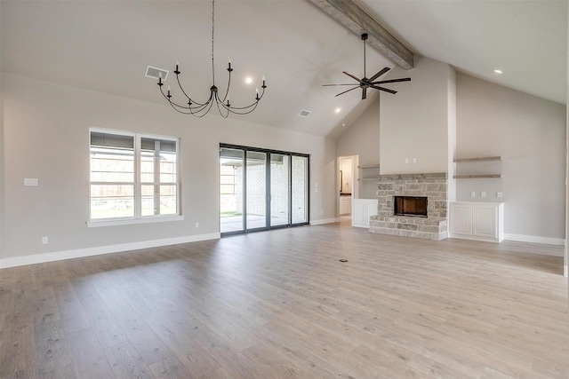 604 Bluff Point Ln, Haslet, TX 76052 - unfurnished living room with beamed ceiling, high vaulted ceiling, a ceiling fan, a chandelier, and a stone fireplace