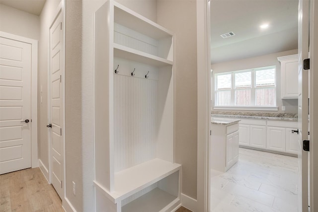 604 Bluff Point Ln, Haslet, TX 76052 - mudroom featuring baseboards
