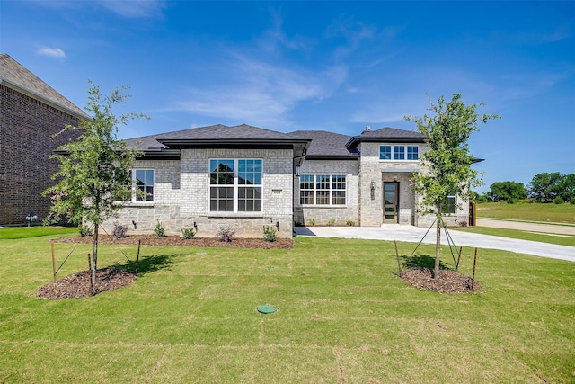 604 Bluff Point Ln, Haslet, TX 76052 - view of front facade with a front yard and brick siding
