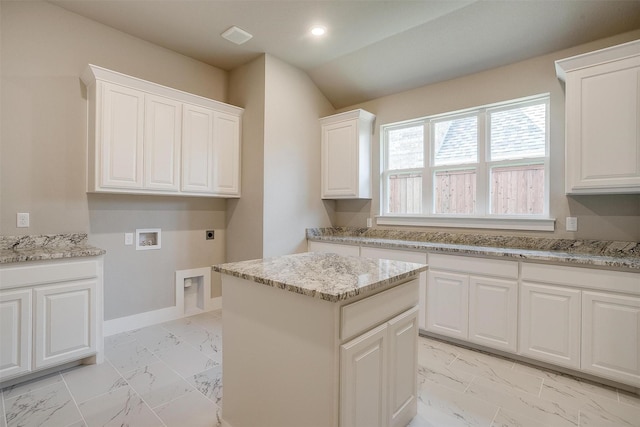 604 Bluff Point Ln, Haslet, TX 76052 - washroom with hookup for an electric dryer, light marble finish flooring, cabinet space, hookup for a washing machine, and recessed lighting