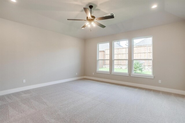 604 Bluff Point Ln, Haslet, TX 76052 - spare room featuring baseboards, light colored carpet, a ceiling fan, and recessed lighting