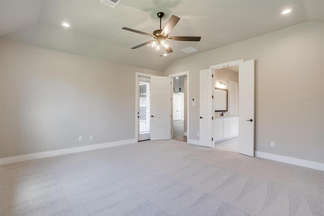 604 Bluff Point Ln, Haslet, TX 76052 - unfurnished bedroom featuring vaulted ceiling, baseboards, recessed lighting, light colored carpet, and ensuite bathroom