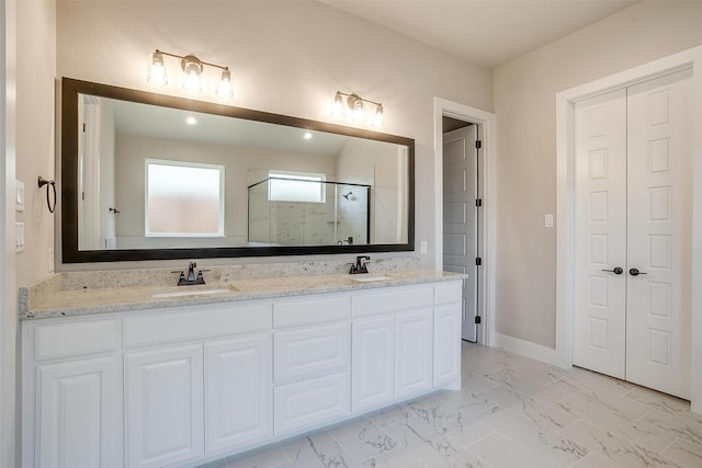 604 Bluff Point Ln, Haslet, TX 76052 - bathroom with double vanity, a shower stall, and marble look tiles
