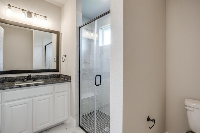 604 Bluff Point Ln, Haslet, TX 76052 - bathroom with toilet, a shower stall, vanity, and marble look tiles