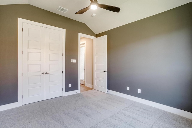 604 Bluff Point Ln, Haslet, TX 76052 - unfurnished bedroom featuring lofted ceiling, a closet, carpet flooring, ceiling fan, and baseboards