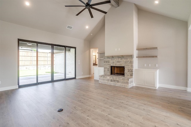 604 Bluff Point Ln, Haslet, TX 76052 - unfurnished living room featuring high vaulted ceiling, ceiling fan, baseboards, beam ceiling, and a fireplace