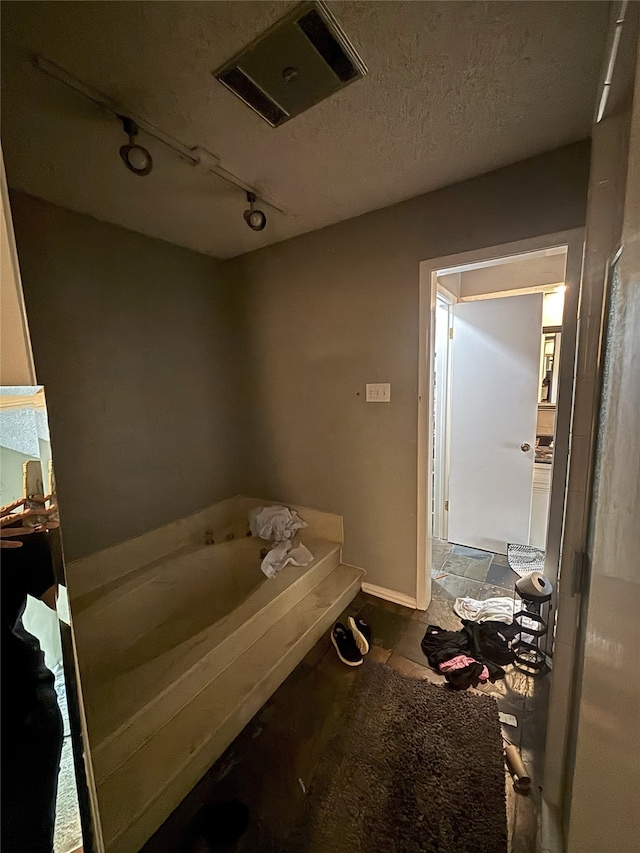 701 Rocky Canyon Rd, Arlington, TX 76012 - full bathroom with a bath and track lighting