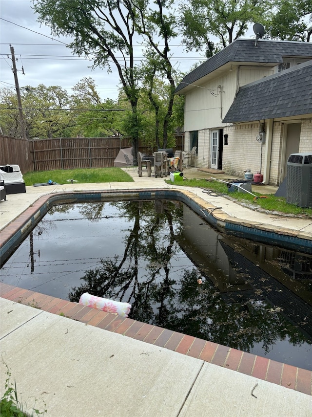701 Rocky Canyon Rd, Arlington, TX 76012 - view of pool featuring a patio and cooling unit