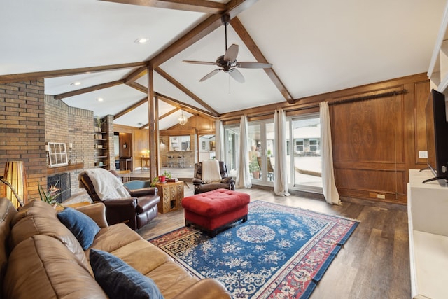 108 Circleview Dr S, Hurst, TX 76054 - living room with wood finished floors, ceiling fan, brick wall, and a fireplace