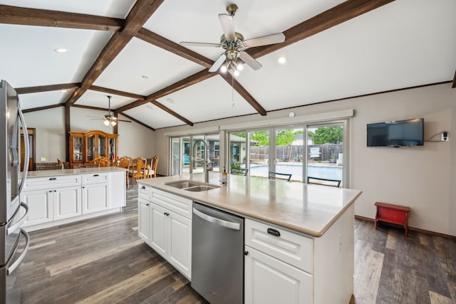 108 Circleview Dr S, Hurst, TX 76054 - kitchen featuring stainless steel appliances, a ceiling fan, a sink, dark wood-style floors, and white cabinets