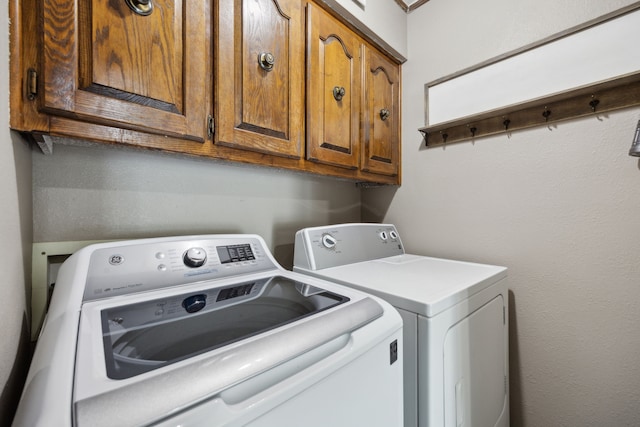 108 Circleview Dr S, Hurst, TX 76054 - laundry room with washer and dryer and cabinet space