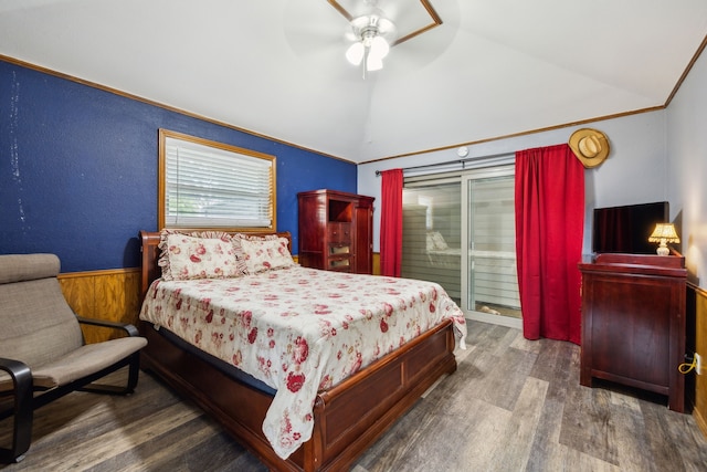 108 Circleview Dr S, Hurst, TX 76054 - bedroom featuring lofted ceiling, wood finished floors, wainscoting, wooden walls, and a ceiling fan