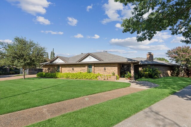 108 Circleview Dr S, Hurst, TX 76054 - single story home with a front yard, a chimney, brick siding, and a shingled roof