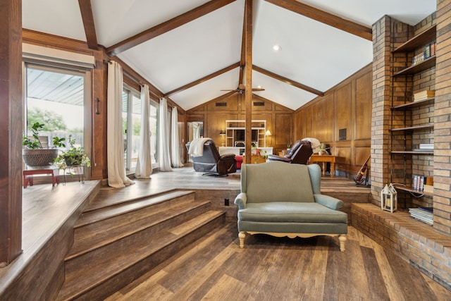 108 Circleview Dr S, Hurst, TX 76054 - living area with wood finished floors, wood walls, and ceiling fan