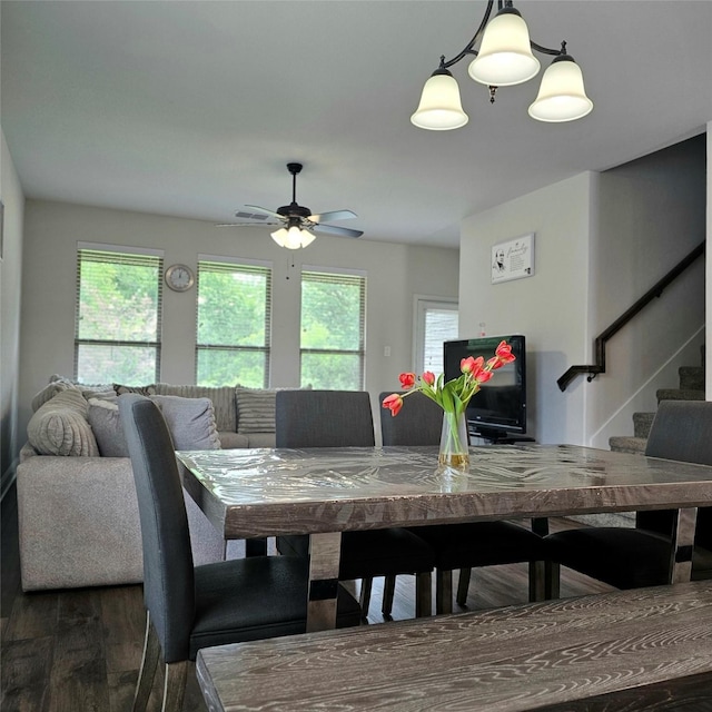 543 Remington Way, Wylie, TX 75098 - dining room with plenty of natural light, wood finished floors, stairway, and a ceiling fan