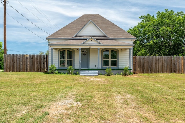 101 S Walnut St, Petrolia, TX 76377 - view of front of house featuring a porch and roof with shingles