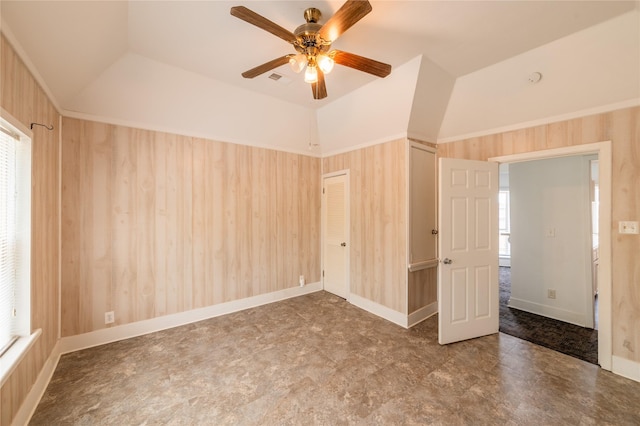 101 S Walnut St, Petrolia, TX 76377 - unfurnished room with healthy amount of natural light, a ceiling fan, and tile patterned floors