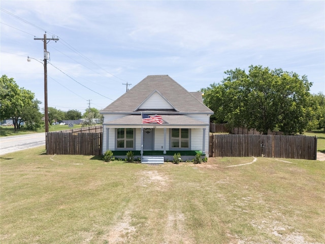 101 S Walnut St, Petrolia, TX 76377 - bungalow-style house with covered porch and roof with shingles