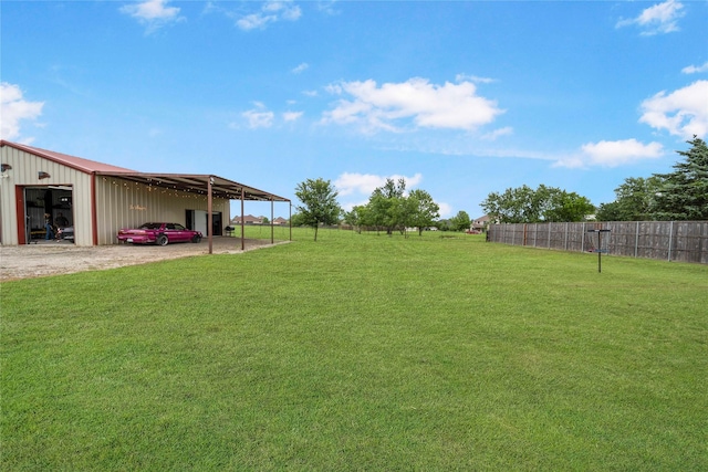 105 Universal Dr, Fate, TX 75189 - view of yard with an outbuilding, a detached garage, and an outdoor structure