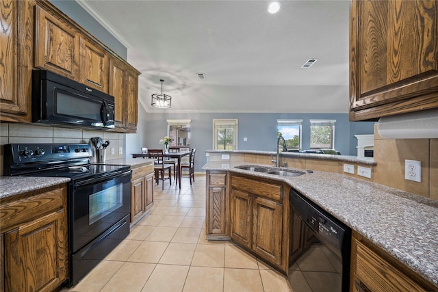 105 Universal Dr, Fate, TX 75189 - kitchen featuring black appliances, a sink, backsplash, light tile patterned floors, and crown molding