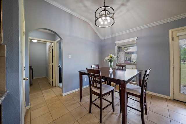 105 Universal Dr, Fate, TX 75189 - dining room featuring arched walkways, crown molding, a chandelier, light tile patterned floors, and lofted ceiling
