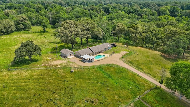 3044 US Highway 80, Grand Saline, TX 75140 - view from above of property featuring a pool and a forest