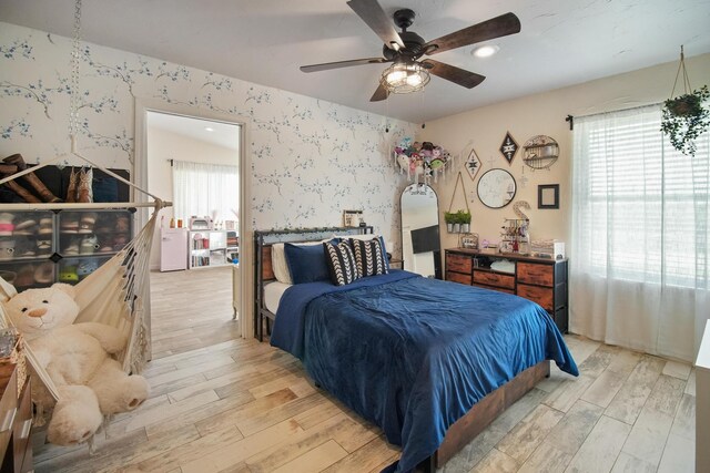 3044 US Highway 80, Grand Saline, TX 75140 - bedroom featuring wallpapered walls, light wood-style flooring, and ceiling fan