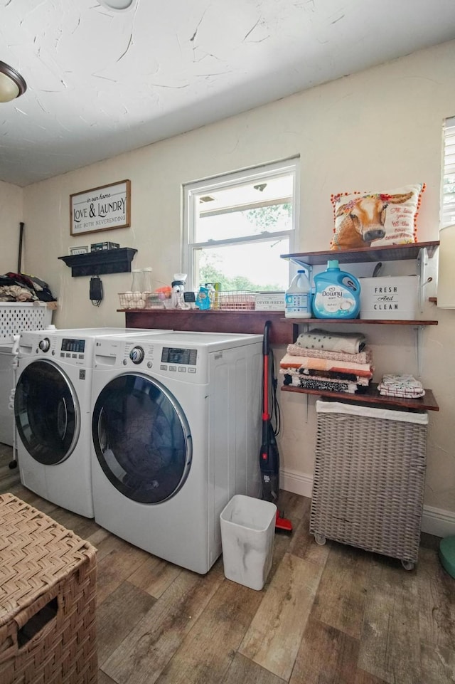 3044 US Highway 80, Grand Saline, TX 75140 - washroom featuring independent washer and dryer, hardwood / wood-style flooring, plenty of natural light, and baseboards