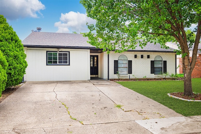 543 S Oldbridge Dr, Allen, TX 75002 - view of front facade with a front lawn, roof with shingles, and brick siding