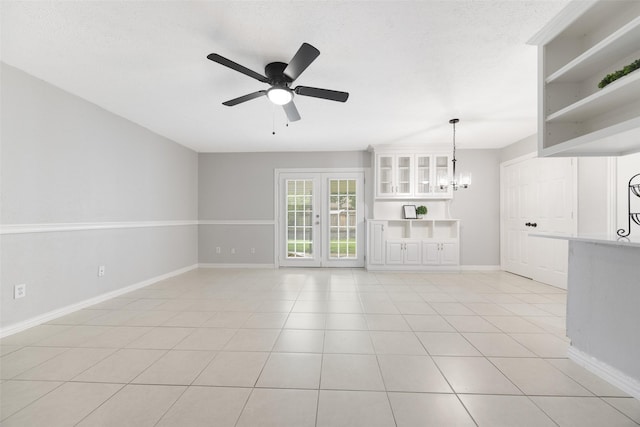 543 S Oldbridge Dr, Allen, TX 75002 - unfurnished living room featuring a chandelier, a ceiling fan, and light tile patterned floors